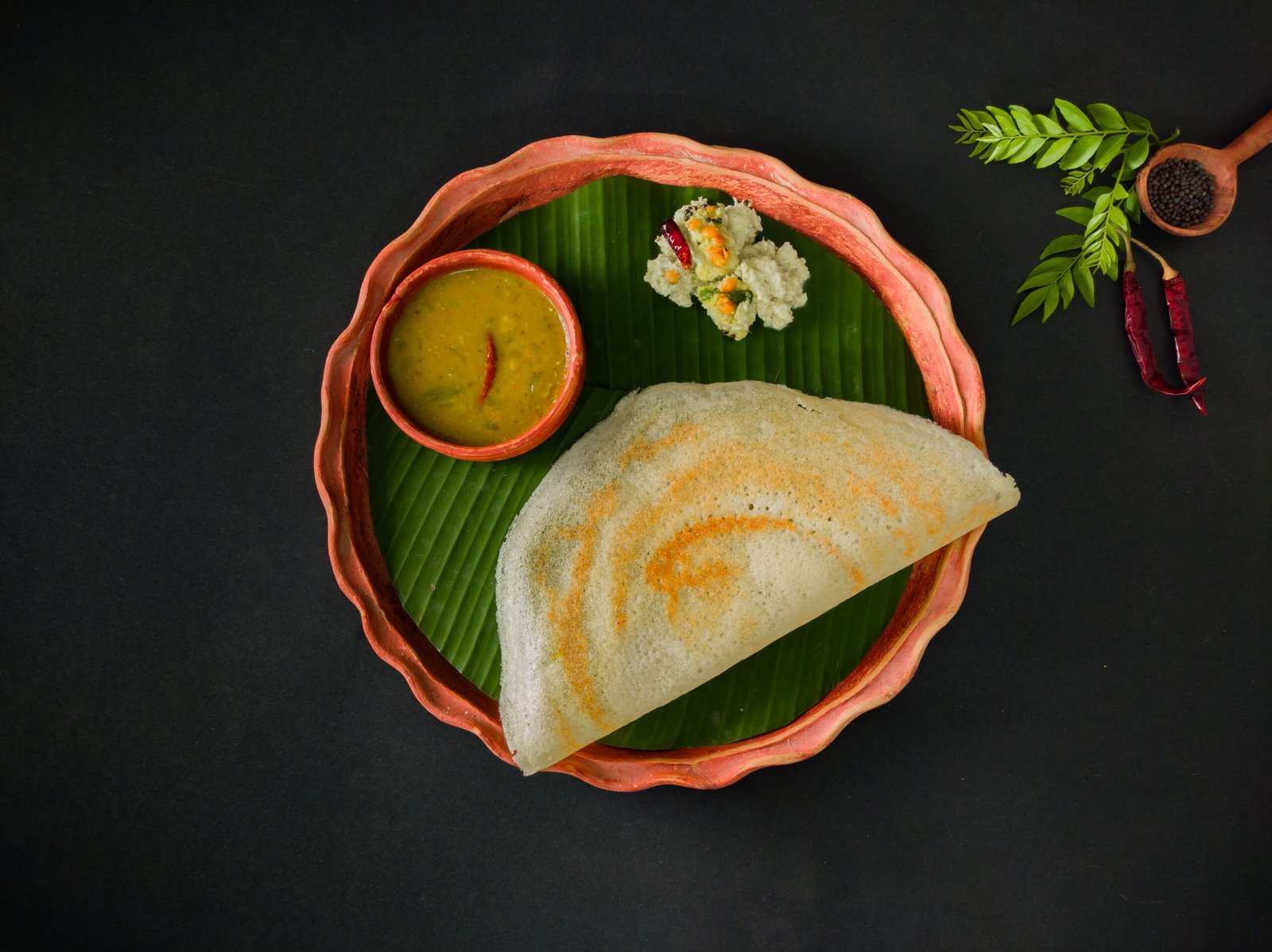 Crisp masala dosa with chutney and sambar